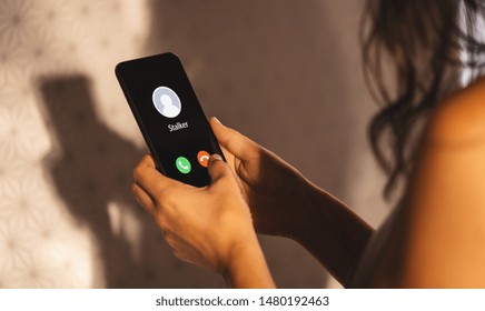 Phone Call From A Stalker At The Morning. Stalking Or Bullying With Smartphone Concept. Stalker Caller, Scammer Or Stranger. Woman Answering To Incoming Call. Ex Boyfriend With Fake Identity.