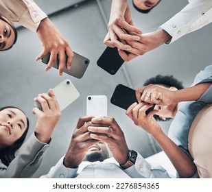 Phone, circle or business people networking on social media searching online news together in low angle. Mobile app technology, digital internet website or group chat community hands typing message - Powered by Shutterstock