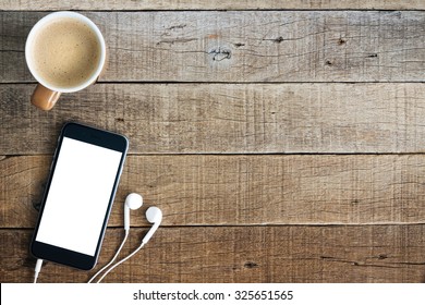 phone and coffee on wood blank space