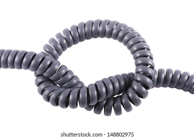 Phone Cord Tied In A Knot On A White Background