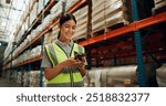 Phone, engineer and woman in warehouse for shipping, distribution or stock inspection on app. Mobile, logistics and happy factory worker check inventory for export, supply chain and quality control