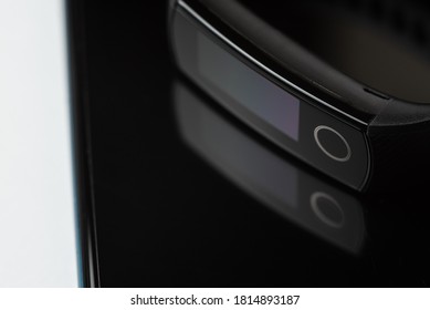 phone and fitness tracker close up on white background