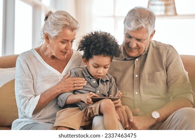 Phone, grandparents and child in home, happy and bonding together in living room. Smartphone, interracial kid and grandpa and grandma in lounge streaming movie, video or internet film on social media - Shutterstock ID 2337463475