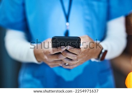 Phone, hands and medical nurse in hospital working on telehealth, research or online consultation. Healthcare smartphone, woman and female physician with mobile for wellness app in clinic at night.