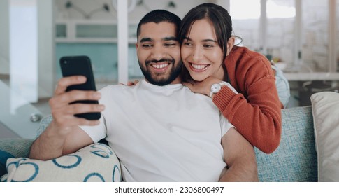 Phone, happy and couple with smile on sofa for social media post, online website and internet. Communication, relationship and man and woman relax on smartphone for quality time, bonding and network - Powered by Shutterstock