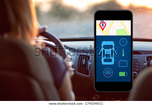 phone with interface auto alarm on a screen on a\
background woman driving a\
car