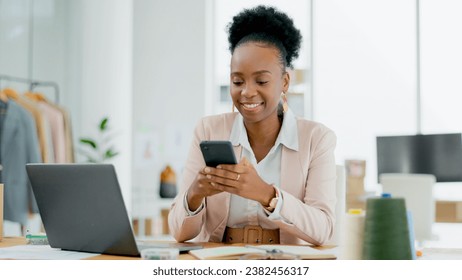 Phone, laptop or black woman on social media in office for networking, online post or break to relax. Text communication, smile or happy African business owner planning on technology, blog or email - Powered by Shutterstock