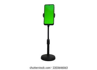 Phone mobile telephone with a vertical green screen in tram chroma key smartphone technology cell phone on white background isolate