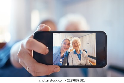 Phone, nurse and happy old woman take a selfie on screen after consulting with medical doctor. Photo, caregiver and healthy senior person in retirement take pictures for social media in nursing home - Powered by Shutterstock