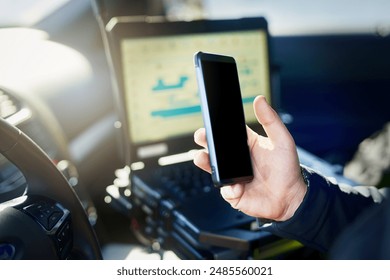Phone, officer and policeman in car for law, innovation and app with legal report or surveillance. Mobile, cop and detective for justice, crime and predictive policing with algorithm or data analysis