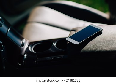 Phone On The Dashboard In The Car