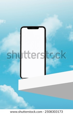 phone is placed on a stand on the right side with the sky in the background