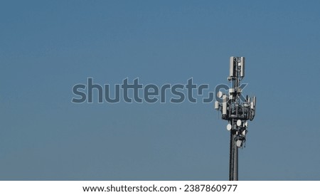 Phone radio repeaters, FWA Mobile signal boost. Tall radio station, modern technologies. Autumn season