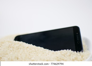 Phone In The Rice Groats. What You Need To Do When The Phone Gets Wet.