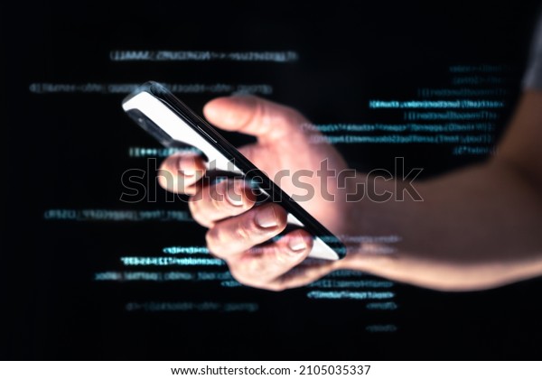 Phone scam, hack or fraud. Data hacker online\
with smartphone. Cell cyber scammer on darknet or internet.\
Phishing or cybersecurity threat with tech and web. Digital code\
technology. Using\
cellphone.
