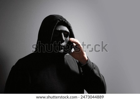 Similar – Image, Stock Photo Anonymous man with smartphone standing in empty green room with glass doors in modern hospital
