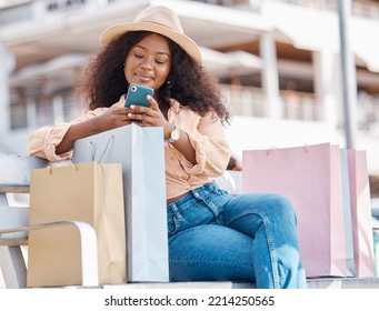 Phone, Shopping And Happy Black Woman With Shop And Store Bags On A Bench Outdoor. Online, Mobile And Ecommerce App Scroll Of A Young Person Smile From Miami With Technology And Retail Paper Bag