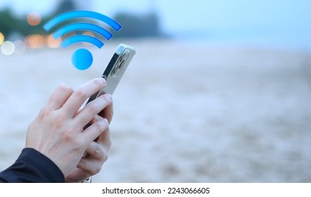 phone with signal internet sign for connect network at beach front - Shutterstock ID 2243066605