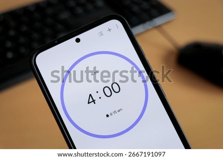 Phone stopwatch 4-minute timer to study with the pomodoro method. Student time planning studying, homework, office productivity.