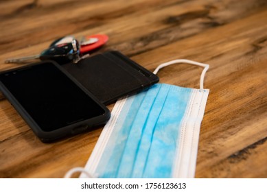 Phone, Wallet, Keys, And Face Mask