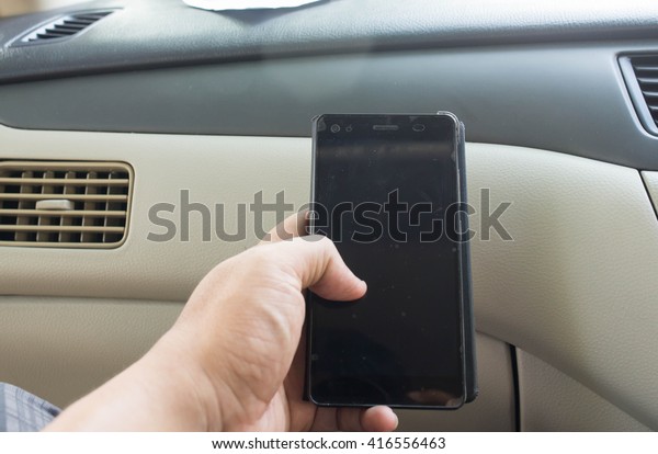 Phones on\
car. Technology for traveling to the\
shop.