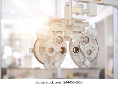 Phoropter for eye test, lenses glasses for eye check in optical store - Powered by Shutterstock