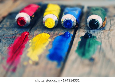 Photo Of  4 Paint Tubes: Red, Yellow, Blue And Green