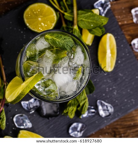 Photo above glass of mojito with ice mint