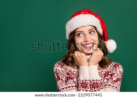 Photo of adorable charming person arms touch collar toothy smile look empty space isolated on green color background