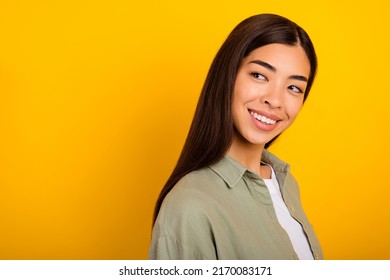 Photo Of Adorable Good Mood Interested Female See Black Friday Promotional Ad Isolated On Yellow Color Background