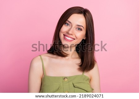 Photo of adorable gorgeous pretty girl bob hairdo wear khaki top toothy smiling at camera stomatology ad isolated on pink color background