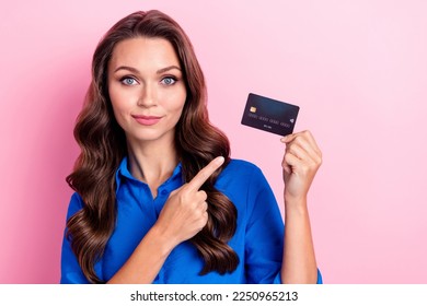 Photo of adorable gorgeous stylish lady hold debit card nfc functions comfort shopping empty space isolated on pink color background