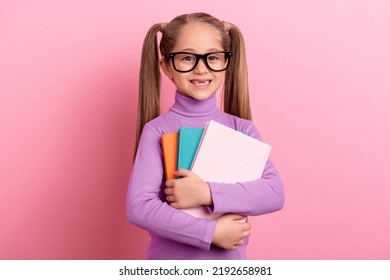 Photo Of Adorable Little Sweet Clever Schoolgirl Go On First Day Of School Isolated On Pink Color Background