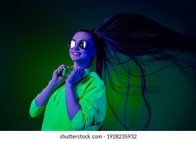 Photo adorable pretty young lady wear green sweater arms headphones dancing isolated colored bright shine background