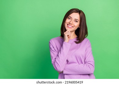 Photo of adorable sweet intelligent lady touch chin thinking solving decisions isolated on green color background - Powered by Shutterstock