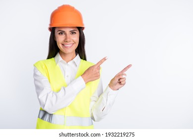 Photo Of Adviser Lady Direct Fingers Empty Space Toothy Smile Wear Helmet Shirt Vest Isolated White Color Background