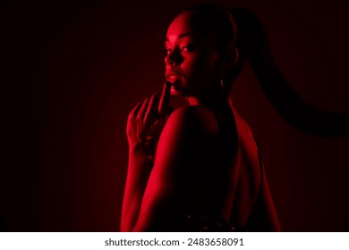 Photo of african lady look touch finger lips feel flirty isolated red color neon background