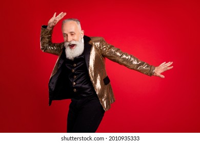 Photo Of Aged Excited Man Happy Positive Smile Have Fun Dance Party Concert Isolated Over Red Color Background