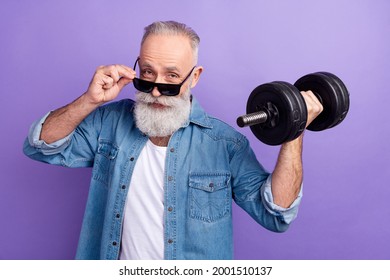 Photo Of Aged Man Sportive Make Exercises Muscles Biceps Dumbells Isolated Over Purple Color Background