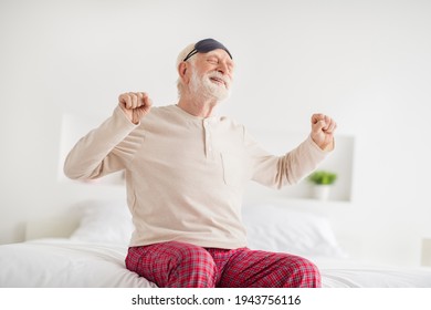 Photo Of Aged Sleepy Man Happy Positive Smile Sit On Bed Home Stretching Wake Up Wear Pajamas Eye Mask