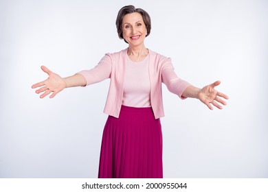 Photo of aged woman happy positive smile open hands hug cuddle welcome friendly isolated over grey color background