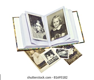 A Photo Album With Old Pictures Of Family Members.