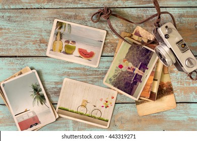 Photo album remembrance and nostalgia of journey honeymoon trip in summer on wood table. instant photo of retro camera - vintage and retro style - Powered by Shutterstock