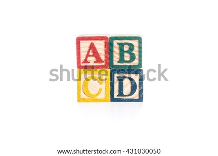 photo of a alphabet blocks spelling ABCD isolate on white background