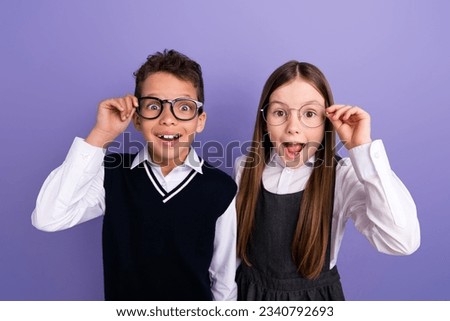 Photo of amazed best buddies clever pupils touch eyeglasses incredible school season sales isolated purple color background