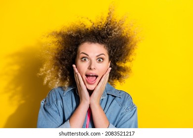 Photo of amazed lady hands cheeks open mouth sale reaction wear jeans shirt isolated yellow color background
