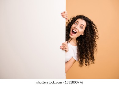Photo of amazing lady holding big white placard presenting novelty information not believe sale prices wear white casual clothes isolated beige pastel color background - Shutterstock ID 1531800776