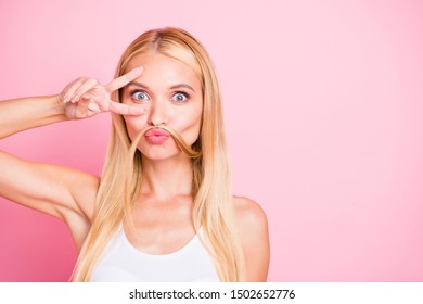 Photo of amazing lady pretending like man making false moustache with curl showing v-sign near eye wear casual isolated pink color background