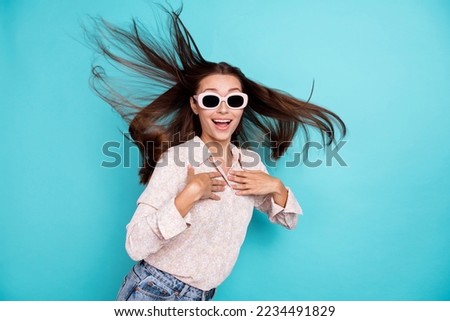 Photo of astonished cheerful stylish lady hold arm chest ask really serious me winner isolated on aquamarine teal color background