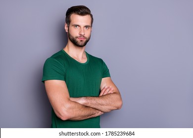 Photo Of Attractive Guy Business Man Boss Worker Neat Hairdo Bristle Arms Crossed Not Smiling Self-confident Person Wear Casual Green T-shirt Isolated Grey Color Background